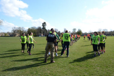 training group warming up in a line